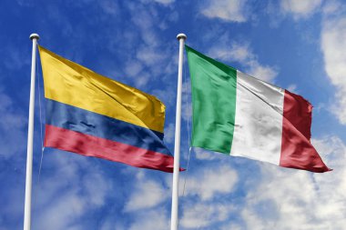 Kolombiya ve İtalya, uluslararası dostluğu, kültürel değişimi ve çeşitli küresel ortaklıkları simgeleyen açık mavi gökyüzüne karşı zarifçe dalgalanan bayraklar.