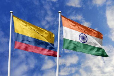 Kolombiya ve Hindistan, gelişen uluslararası ilişkiler, kültürel çeşitlilik ve küresel işbirliğini temsil eden mavi gökyüzünün zeminine görkemli bir şekilde bayraklar açıyor..