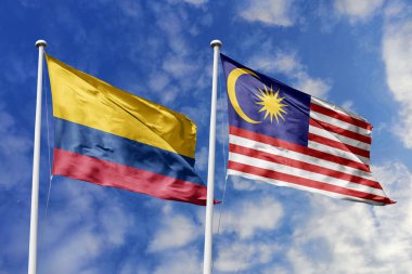 Kolombiya ve Malezya bayrakları gururla el sallayarak uluslararası ilişkileri, dostluğu ve kültürel değişimi simgeliyor..