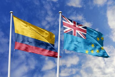 Kolombiya ve Tuvalu 'nun canlı bayrakları Parlak Mavi Gökyüzü Altında Zarifçe Dalgalanıyor, Büyüyen Diplomatik İlişkiler ve Güney Amerika ile Pasifik Adaları arasında Bir Köprü.
