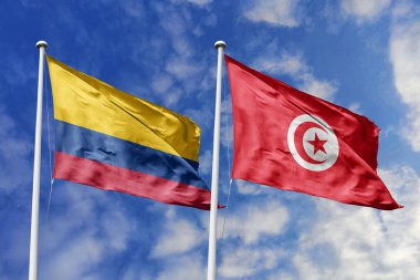 Kolombiya ve Tunus 'un Canlı Bayrakları Parlak Mavi Gök Altında Birlikte Dalgalanıyor, Büyüyen Diplomatik İlişkiler ve Çeşitli Kıtalar ve Kültürler Arasında Bir Köprü.