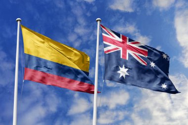 Kolombiya ve Avustralya Bayrakları Parlak Mavi Gökyüzü Altında Birlikte Dalgalanıyor
