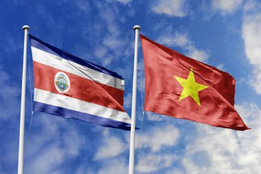 Kosta Rika ve Vietnam Bayrakları, Dinamik Mavi Gökyüzüne Karşı Birlikte Dalgalanıyor, Diplomatik İlişkiler ve Güneydoğu Asya Bağlantılarını sembolize ediyor.