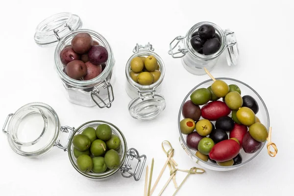 Olives Glass Jars Skewers Table Flat Lay White Background Obraz Stockowy