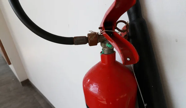 A fire extinguisher is an active fire protection device used to extinguish or control small fires, often in emergency situations. can also be called a small extinguisher for indoor
