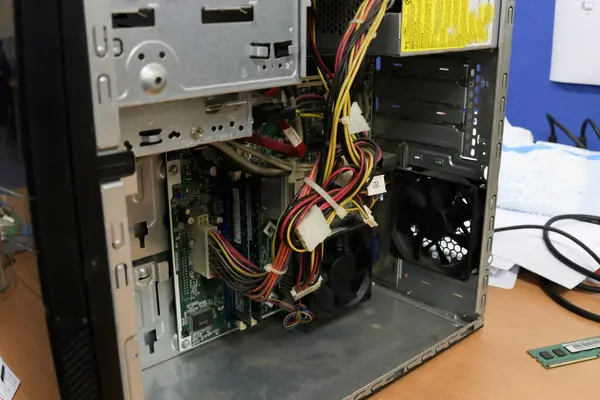 Technicians are repairing and installing hardware on a computer or personal computer