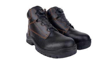                                 Genellikle rock şarkıcıları, gençler, askerler ve inşaat işçileri tarafından giyilen siyah deri botların fotoğrafı.      