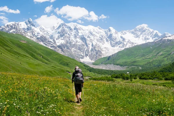 Stock image Tourist with a backpack in Caucasus mountains. Svaneti region, Georgia