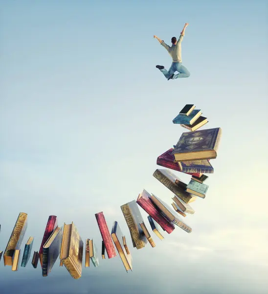 Man Springt Van Een Stapel Boeken Onderwijs Zelfontwikkeling Dit Een Rechtenvrije Stockafbeeldingen