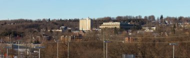 Sherbrooke downtown during winter. Panoramic view of small city in Quebec, Canada. Panoramic view snow and college cityscape