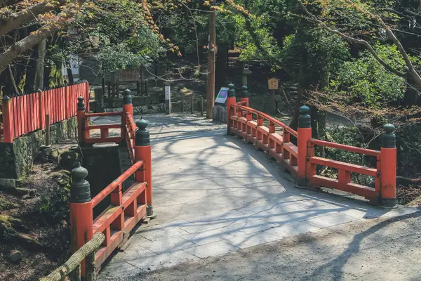 stock image Kasuga taisha shinto shrine pathway. red bridge 9 April 2012