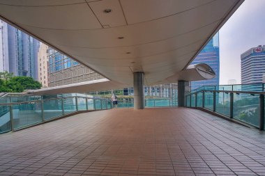 13 Oct 2012 pedestrian walkway and traffic in Hong Kong city