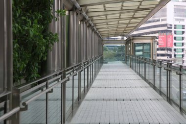 13 Oct 2012 pedestrian walkway and traffic in Hong Kong city
