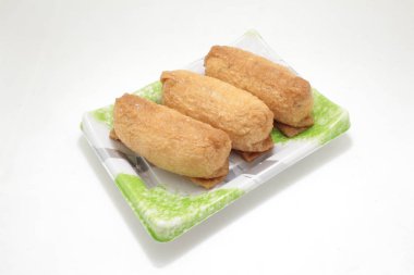Inari sushi, vinegared boiled rice wrapped in fried tofu Japanese cuisine,