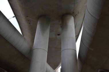 Concrete structure and asphalt road space under the overpass