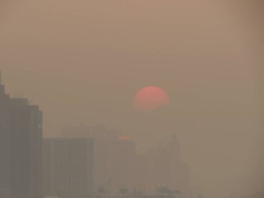 Golden sunset sky, the foggy day at hk