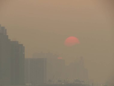 Golden sunset sky, the foggy day at hk