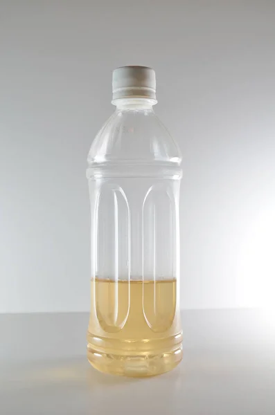 a Natural sunflower oil in a bottle