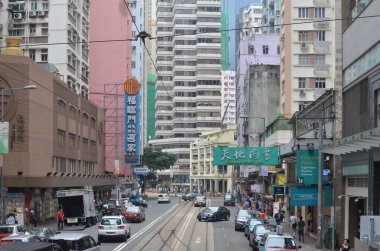 20 April 2013 view with famous trams at Wan Chai district of Hong Kong