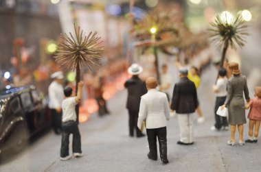 a scale model and figure , the city life