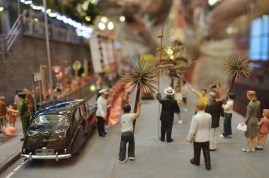a scale model and figure , the city life