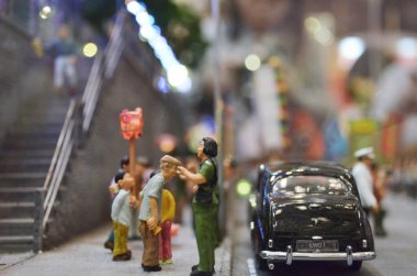 a scale model and figure , the city life