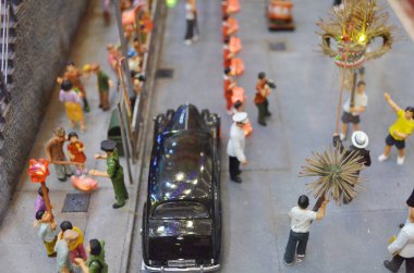 a scale model and figure , the city life