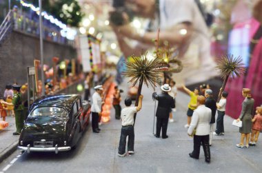 a scale model and figure , the city life