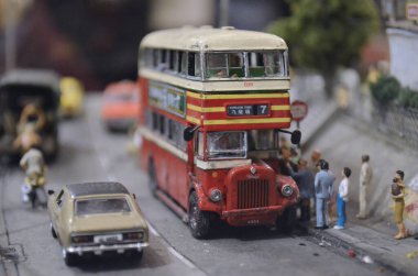 a scale model and figure , the city life