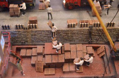 a scale model and figure , the city life