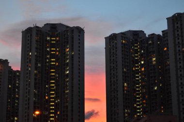 a Modern apartment buildings on night. hk 6 July 2013
