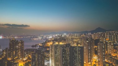 Feb 15 2023 Skyscraper high rise buildings. view at Victoria Harbour sunset.