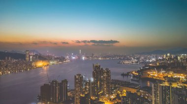 Feb 15 2023 Skyscraper high rise buildings. view at Victoria Harbour sunset.