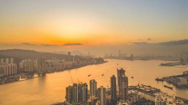Feb 15 2023 Skyscraper high rise buildings. view at Victoria Harbour sunset.