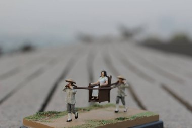 a scale of figure, sedan chair figure