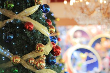 a Christmas Tree with Decorations, Gifts and decorations.