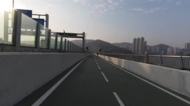 Feb 20 2023 view from bike, the Cross Bay Bridge Bike tail.