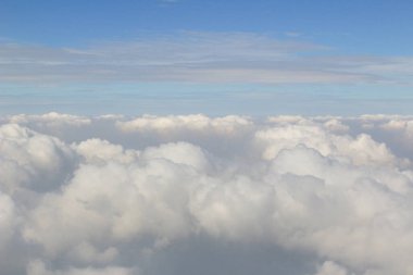 the Plane fly with cloud Blue sky