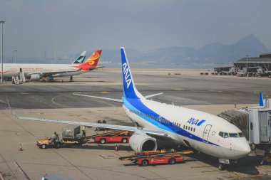 a Preparing of airplane for flight in Hong Kong International Airport