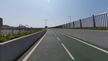 Feb 26 2023 view from bike, the Cross Bay Bridge Bike tail.