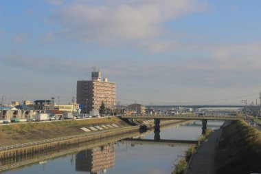 Japonya, Nagoya manzarası. 30 Ekim 2013 Treni 'nde görünüm