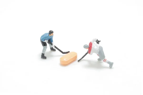 a Hockey players starts game with the pill