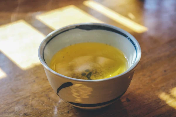 the japan green tea with wood background