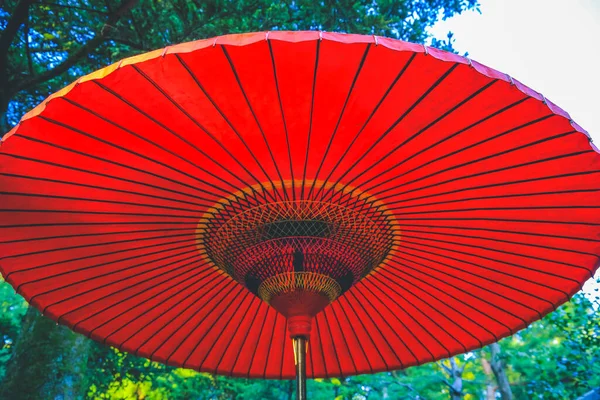 stock image close up of Japanese red umbrella at Kenroku Garden