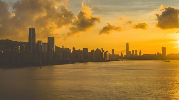 stock image HK skyline in the afternoon over Victoria Harbour, July 6 2023