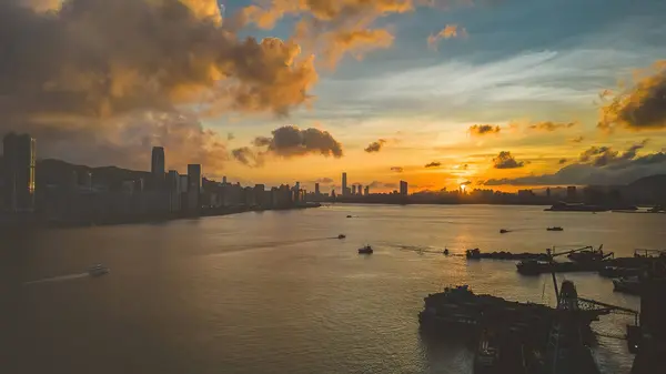 stock image HK skyline in the afternoon over Victoria Harbour, July 6 2023