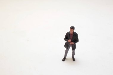 a tiny of figure of man people