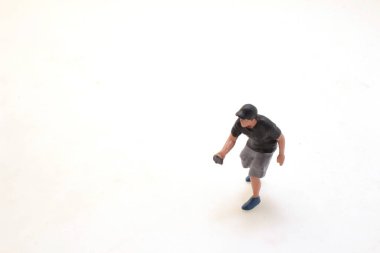 a tiny of figure of man people
