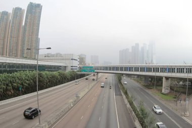 Hong Kong - 7 Mart 2015: Gündüz vakti Honk Kong şehrinde uzun apartmanlar