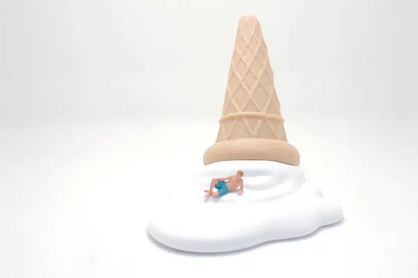 a fun of figure with the ice cream swim